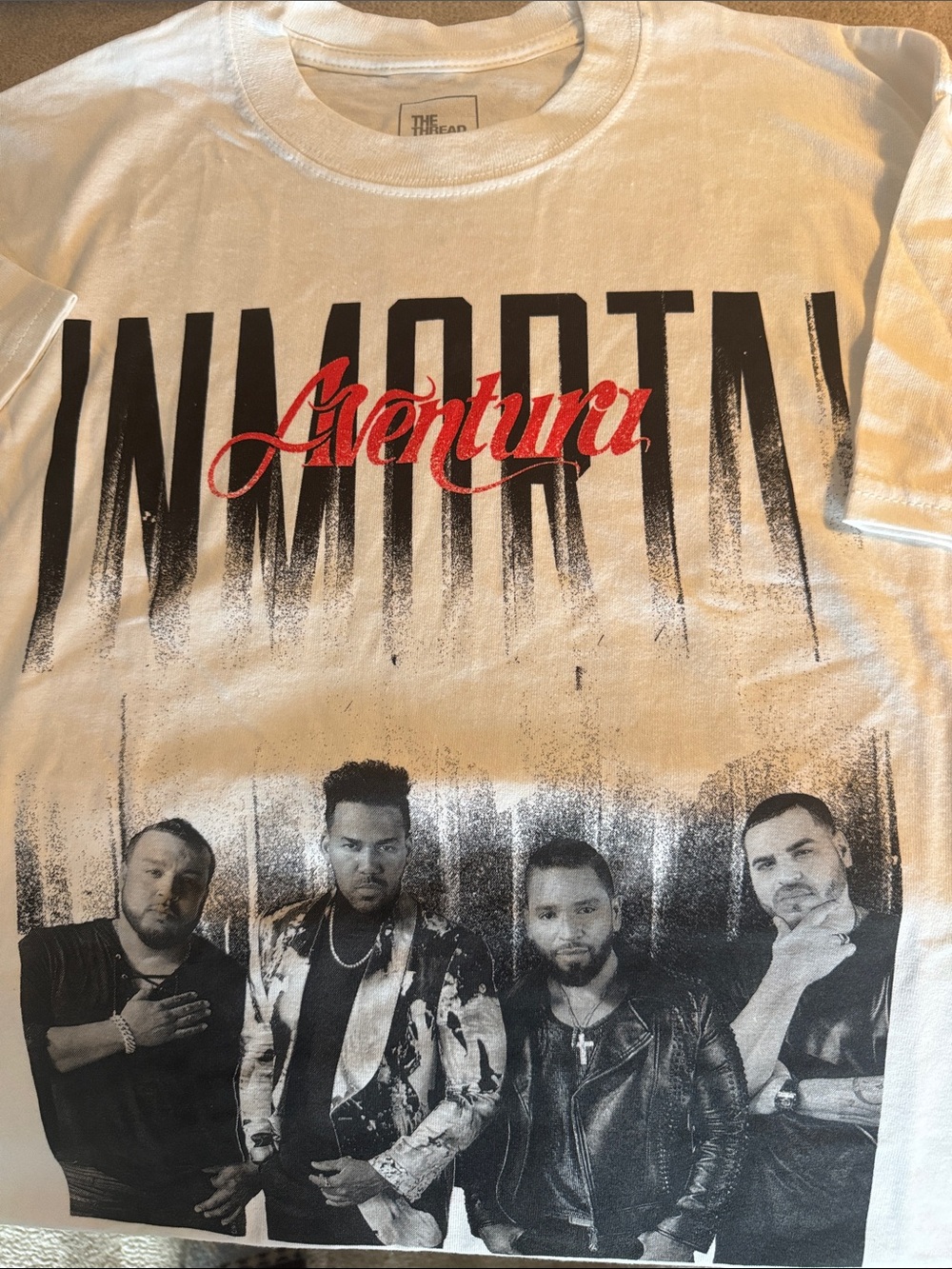 Aventura Graphic Tee - White with Black & Red Print. 2 size Med